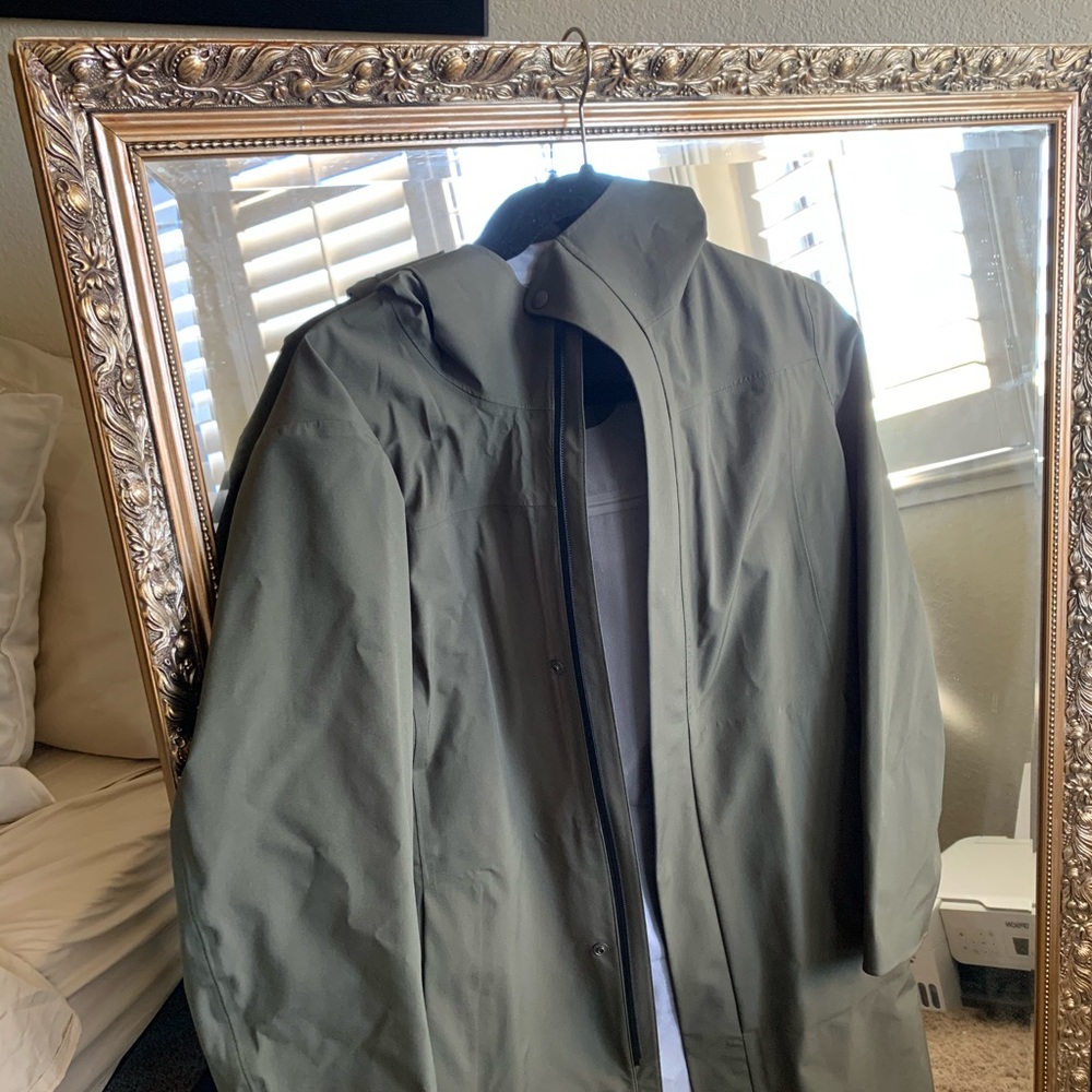 Muji green raincoat small